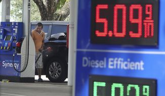 For the first time ever, the price for a gallon of regular gas in Broward County is selling at some gas stations for more than five dollars, as seen at this Mobil station in Margate, Fla., on Sunday, June, 12, 2022. (Joe Cavaretta/South Florida Sun-Sentinel via AP)