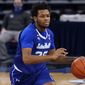Seton Hall guard Jahari Long controls the ball against DePaul during the first half of an NCAA college basketball game in Chicago, Saturday, Jan. 9, 2021. (AP Photo/Nam Y. Huh) **FILE**
