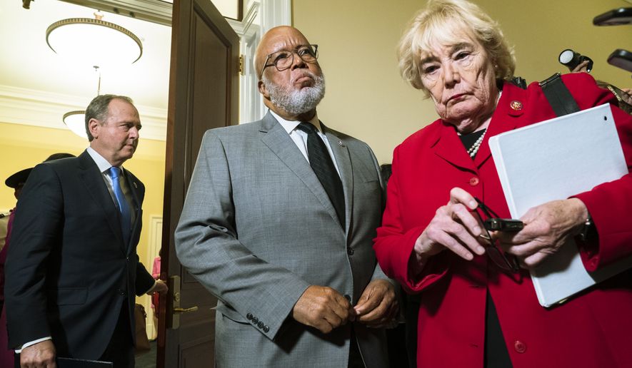 House select committee investigating the Jan. 6 attack on the U.S. Capitol Chairman Bennie Thompson, D-Miss., and Rep. Zoe Lofgren, D-Calif., listen questions from reporters as they leave the hearing room on Capitol Hill in Washington, Monday, June 13, 2022. Behind Thompson is Rep. Adam Schiff, D-Calif. (AP Photo/Manuel Balce Ceneta)