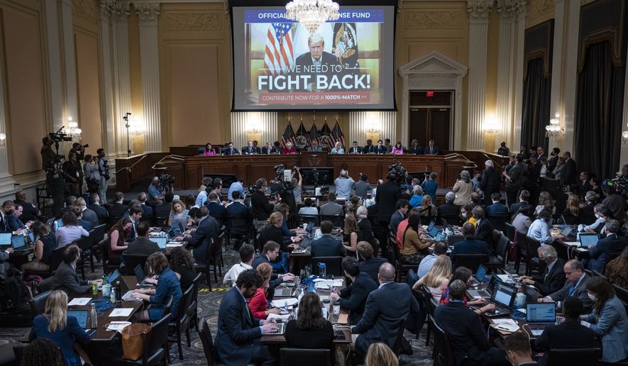 An image of former President Donald Trump is shown on a screen as the House select committee tasked with investigating the January 6th attack on the Capitol hold a hearing on Capitol Hill on Monday, June 13, 2022 in Washington. (Jabin Botsford//The Washington Post via AP, Pool)