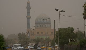 A mosque is shrouded in dust during a sandstorm in Baghdad, Iraq, Monday, June 13, 2022. (AP Photo/Hadi Mizban) ** FILE **
