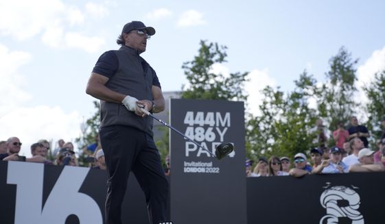 Phil Mickelson of the United States waits to play his tee shot on the 16th hole during the final round of the inaugural LIV Golf Invitational at the Centurion Club in St Albans, England, Saturday, June 11, 2022. (AP Photo/Alastair Grant) **FILE**