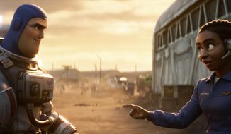 This image released by Disney/Pixar shows character Buzz Lightyear, voiced by Chris Evans, left, and Alisha Hawthorne, voiced by Uzo Aduba, in a scene from the animated film &amp;quot;Lightyear,&amp;quot; releasing June 17. The United Arab Emirates on Monday, June 13, 2022, banned the upcoming Pixar animated feature “Lightyear&amp;quot; from showing in movie theaters amid reports that the film includes a kiss between two female characters. (Disney/Pixar via AP, File)