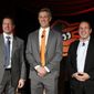 Mike Elias, center, the Baltimore Orioles&#39; new executive vice president and general manager, poses for a photo with Orioles ownership representative Louis Angelos, left, and executive vice president John Angelos, right, after a baseball news conference Nov. 19, 2018, in Baltimore. Orioles CEO John Angelos was accused in a lawsuit this week of seizing control of the team at the expense of his brother Lou — and in defiance of their father Peter&#39;s wishes. (AP Photo/Patrick Semansky, File) **FILE**