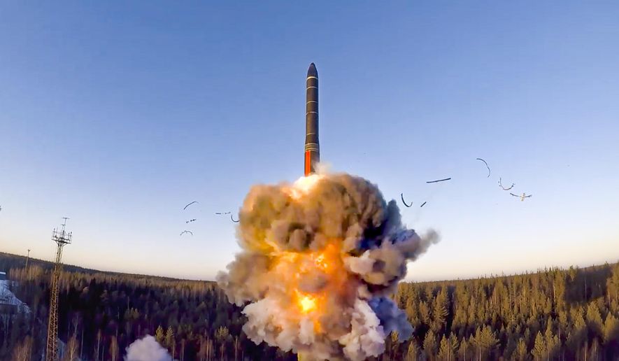 In this file photo taken from a video distributed by Russian Defense Ministry Press Service, on Wednesday, Dec. 9, 2020, a rocket launches from missile system as part of a ground-based intercontinental ballistic missile test launched from the Plesetsk facility in northwestern Russia.  A Swedish arms watchdog says the world’s stockpiles of nuclear weapons are expected to increase in coming years after declining since the end of the Cold War. (Russian Defense Ministry Press Service via AP, File)
