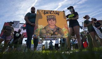 Supporters of the family of slain Army Spc. Vanessa Guillen gather before a news conference on the National Mall in front of Capitol Hill, on July 30, 2020, in Washington. As public pressure mounts for more information on the deadly Uvalde school shooting, some are concerned that Texas officials will use a legal loophole to block records from being released — even to the victims&#39; families — once the case is closed. (AP Photo/Carolyn Kaster, File)