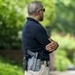 A U.S. Marshal patrols outside the home of Supreme Court Justice Brett Kavanaugh, in Chevy Chase, Md., June 8, 2022. The House has given final approval to legislation to allow around-the-clock security protection for families of Supreme Court justices. The vote on Tuesday came one week after a man carrying a gun, knife and zip ties was arrested near Justice Brett Kavanaugh’s house after threatening to kill the justice.  (AP Photo/Jacquelyn Martin, File)