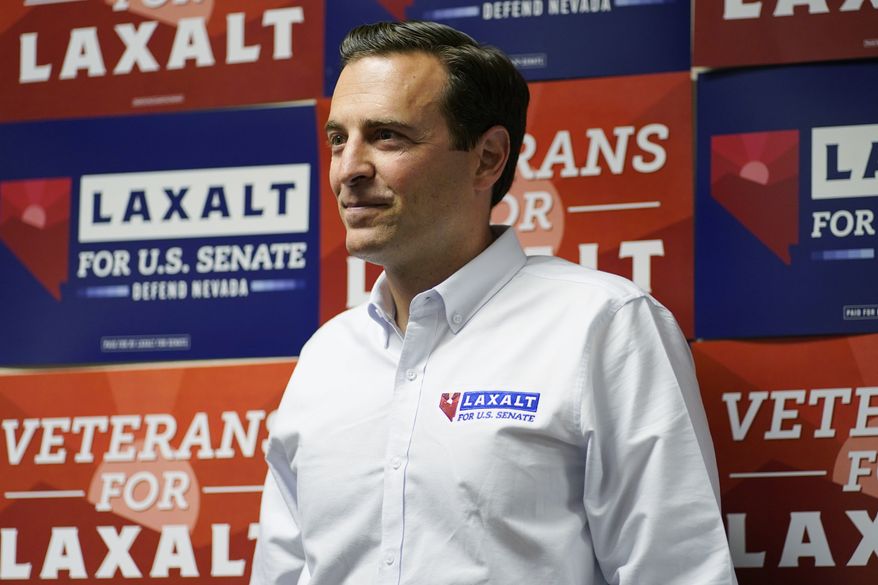 Republican Nevada Senate candidate Adam Laxalt waits to speak at a campaign event June 11, 2022, in Las Vegas. (AP Photo/John Locher)