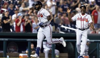 Atlanta Braves&#39; Michael Harris II heads home to score on a home run during the sixth inning of the team&#39;s baseball game against the Washington Nationals on Tuesday, June 14, 2022, in Washington. (AP Photo/Julia Nikhinson)