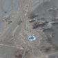 This satellite image from Maxar Technologies shows an overview of launch pad activity at Imam Khomeini Space Center southeast of Semnan, Iran on Tuesday, June 14, 2022.   Iran appeared to be readying for a space launch Tuesday as satellite images showed a rocket on a rural desert launch pad, just as tensions remain high over Tehran&#39;s nuclear program.  The images from Maxar Technologies showed a launch pad at Imam Khomeini Spaceport in Iran’s rural Semnan province, the site of frequent recent failed attempts to put a satellite into orbit.   (Satellite image ©2022 Maxar Technologies via AP)