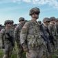 U.S. army soldiers line up at the Vay Adam Military Training Base near Hajduhadhaz, northeastern Hungary, Wednesday, June 15, 2022. The American unit carries out a joint patrol with Hungarian troops in County Szabolcs-Szatmar-Bereg bordering Ukraine. (Zsolt Czegledi/MTI via AP)  **FILE**