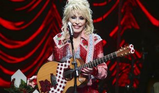 Dolly Parton performs at Austin City Limits Live during Blockchain Creative Labs&#39; Dollyverse event during the South by Southwest Music Festival on March 18, 2022, in Austin, Texas. Parton is donating $1 million to pediatric infectious disease research at Vanderbilt University Medical Center in Nashville, the organization announced on Wednesday, June 15, 2022. The new gift is one of several Parton has made to the center over the years, including a $1 million gift in April 2020 for COVID vaccine research. (Photo by Jack Plunkett/Invision/AP, File)