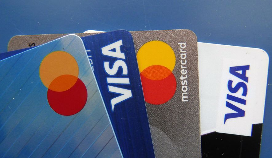 Credit cards as seen Thursday, July 1, 2021, in Orlando, Fla. (AP Photo/John Raoux, File)