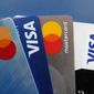 Credit cards as seen Thursday, July 1, 2021, in Orlando, Fla. (AP Photo/John Raoux, File)