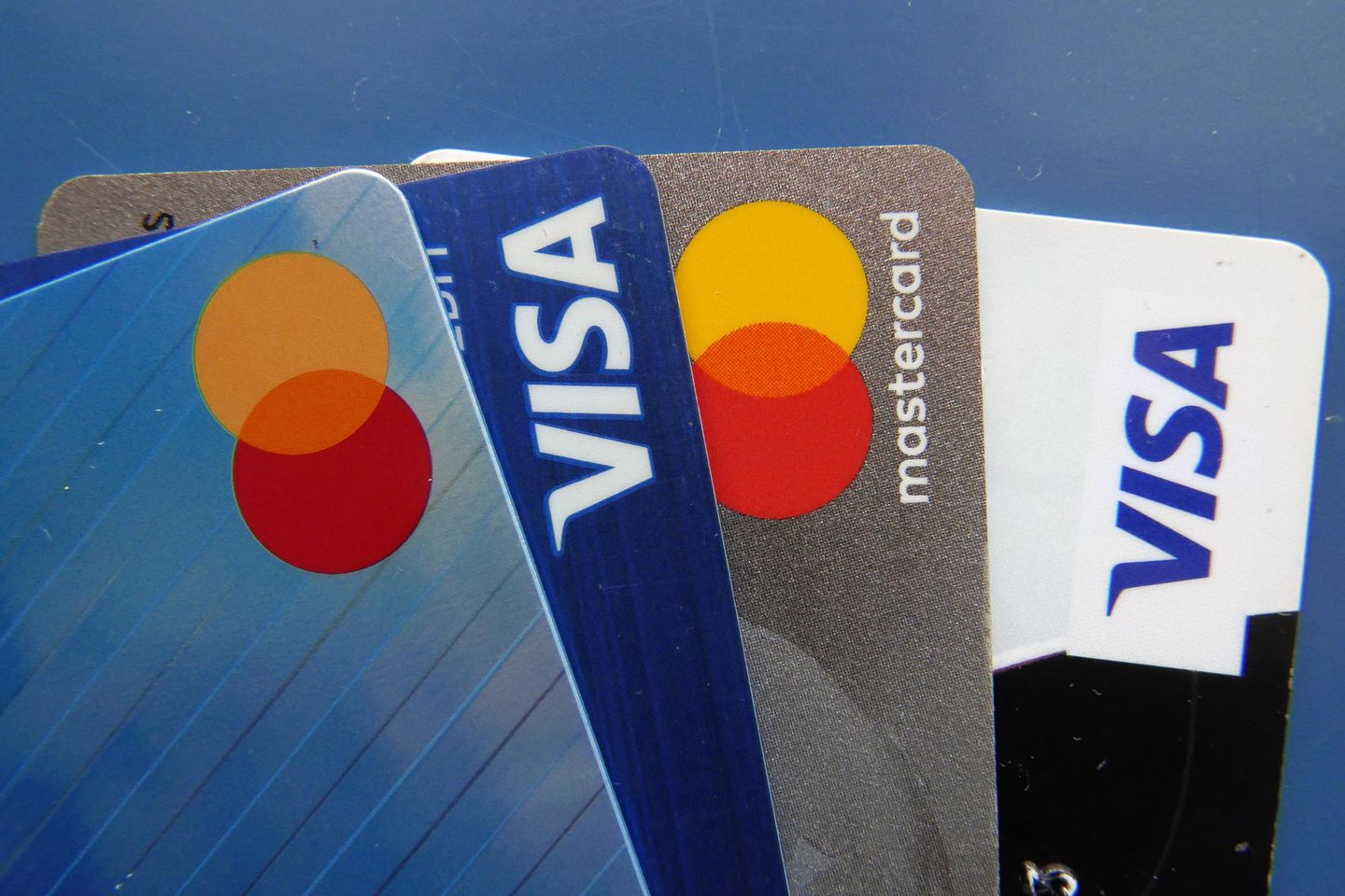 Americans rely on credit cards to ease pain of inflation, spend through summer