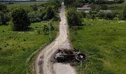 A ruined tank on a road in Lypivka, on the outskirts of Kyiv, Ukraine, Tuesday, June 14, 2022. Russia’s invasion of Ukraine is spreading a deadly litter of mines, bombs and other explosive devices that will endanger civilian lives and limbs long after the fighting stops. (AP Photo/Natacha Pisarenko)