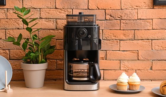 American researcher Christopher Balding said he uncovered evidence that China is devouring data collected through smart coffee machines made in the communist country. Coffee pot. Photo credit: Pixel-Shot via Shutterstock.
