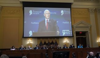A video of former Vice President Mike Pence speaking before The Federalist Society as the House select committee investigating the Jan. 6, 2021, attack on the Capitol holds a hearing at the Capitol in Washington, Thursday, June 16, 2022. (AP Photo/J. Scott Applewhite)