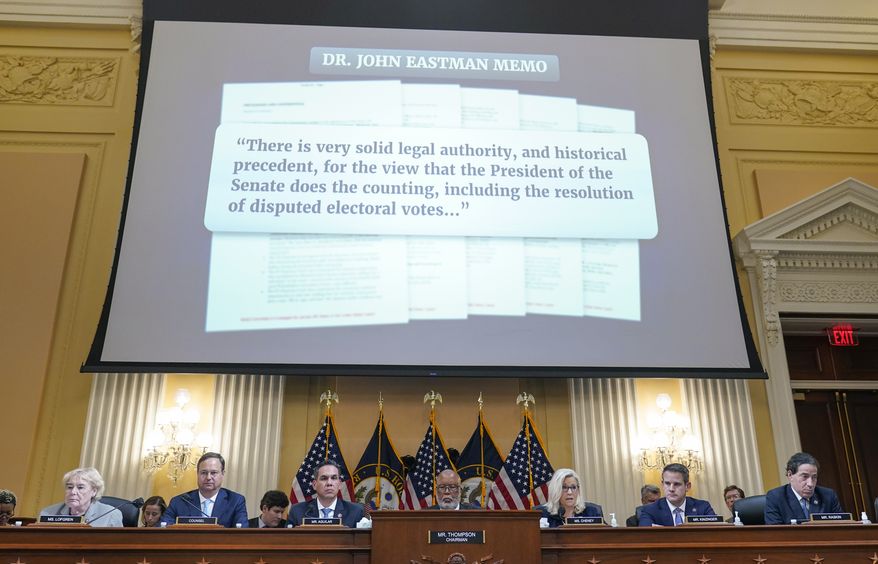 Part of a memo from John Eastman, a lawyer for former President Donald Trump, is displayed on the screen as the House select committee investigating the Jan. 6, 2021, attack on the Capitol holds a hearing at the Capitol in Washington, Thursday, June 16, 2022. (AP Photo/Susan Walsh)