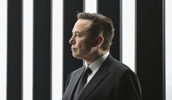 Elon Musk, Tesla CEO, attends the opening of the Tesla factory Berlin Brandenburg in Gruenheide, Germany, March 22, 2022. Musk appealed a federal court ruling Wednesday, June 15, 2022, that upheld a securities fraud settlement over Musks tweets claiming that he had the funding to take Tesla private in 2018. (Patrick Pleul/Pool via AP, File)