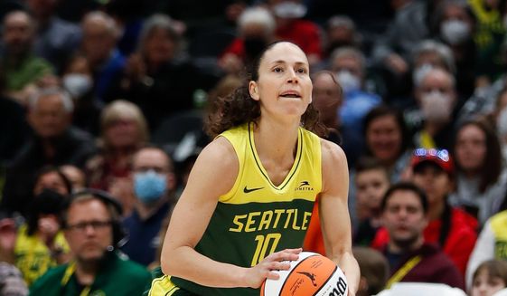 Seattle Storm guard Sue Bird lines up a 3-point shot against the Los Angeles Sparks during the second quarter of a WNBA basketball game Friday, May 20, 2022, in Seattle. (Jennifer Buchanan/The Seattle Times via AP)