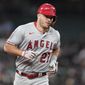 Los Angeles Angels&#39; Mike Trout runs the bases after he hit a two-run home run against the Seattle Mariners during the seventh inning of a baseball game Thursday, June 16, 2022, in Seattle. The homer was Trout&#39;s second of the night. (AP Photo/Ted S. Warren)