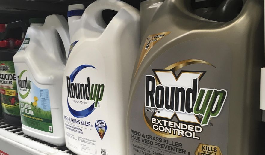 Containers of Roundup are displayed on a store shelf in San Francisco, on Feb. 24, 2019. (AP Photo/Haven Daley, File)