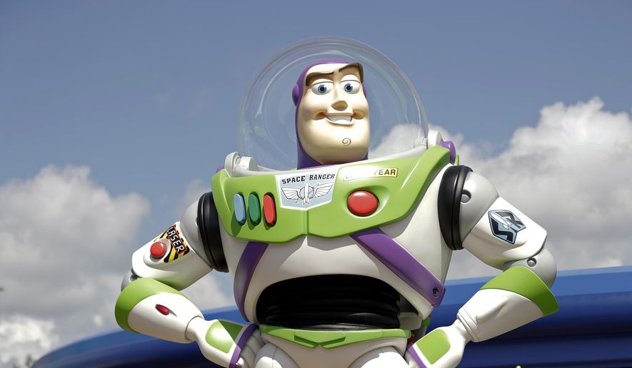 Character Buzz Lightyear stands near the entrance to the Aliens Swirling Saucers ride at Toy Story Land in Disney&#x27;s Hollywood Studios at Walt Disney World in Lake Buena Vista, Fla., June 23, 2018. Malaysia&#x27;s film censors said Friday, June 17, 2022, that it was Disney&#x27;s decision to ax the animated film “Lightyear” from the country&#x27;s cinemas after refusing to cut scenes promoting homosexuality. (AP Photo/John Raoux, File)