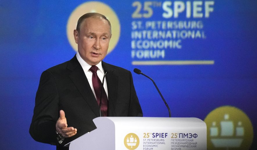 Russian President Vladimir Putin gestures as he addresses a plenary session of the St. Petersburg International Economic Forum in St. Petersburg, Russia, Friday, June 17, 2022. Putin began his address to the St. Petersburg International Economic Forum with a lengthy denunciation of countries that he contends want to weaken Russia, including the United States who, he said, "declared victory in the Cold war and later came to think of themselves as God's own messengers on planet Earth." (AP Photo/Dmitri Lovetsky)