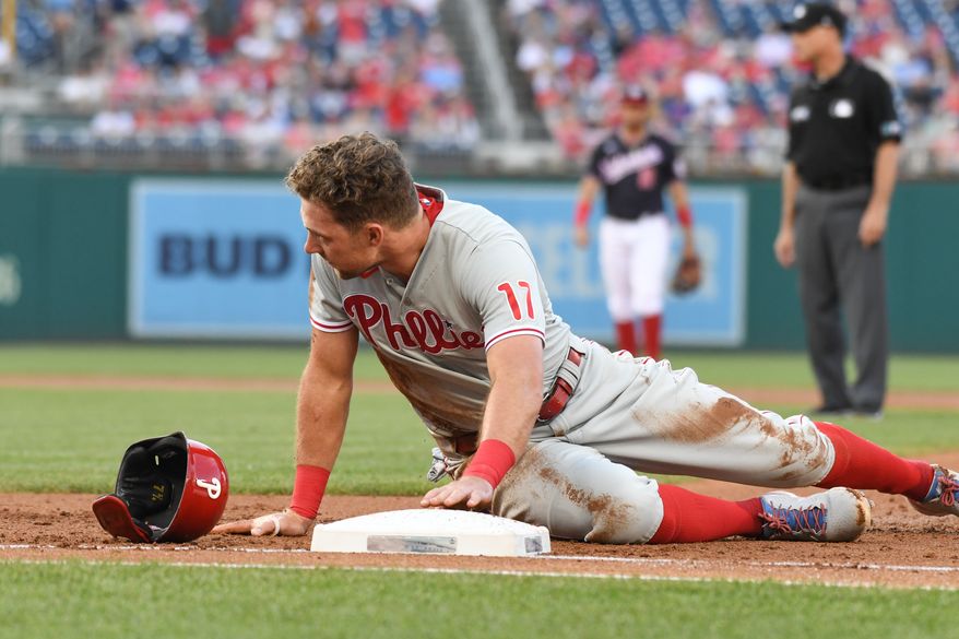 Philadelphia Phillies first baseman Rhys Hoskins (17) after getting picked off by Washington Nationals catcher Keibert Ruiz (20) during the 1st inning at Nationals Park in Washington D.C., June 17, 2022. (Photo by All-Pro Reels)