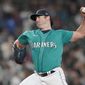Seattle Mariners starting pitcher Robbie Ray throws against the Los Angeles Angels during the first inning of a baseball game, Friday, June 17, 2022, in Seattle. (AP Photo/Ted S. Warren)