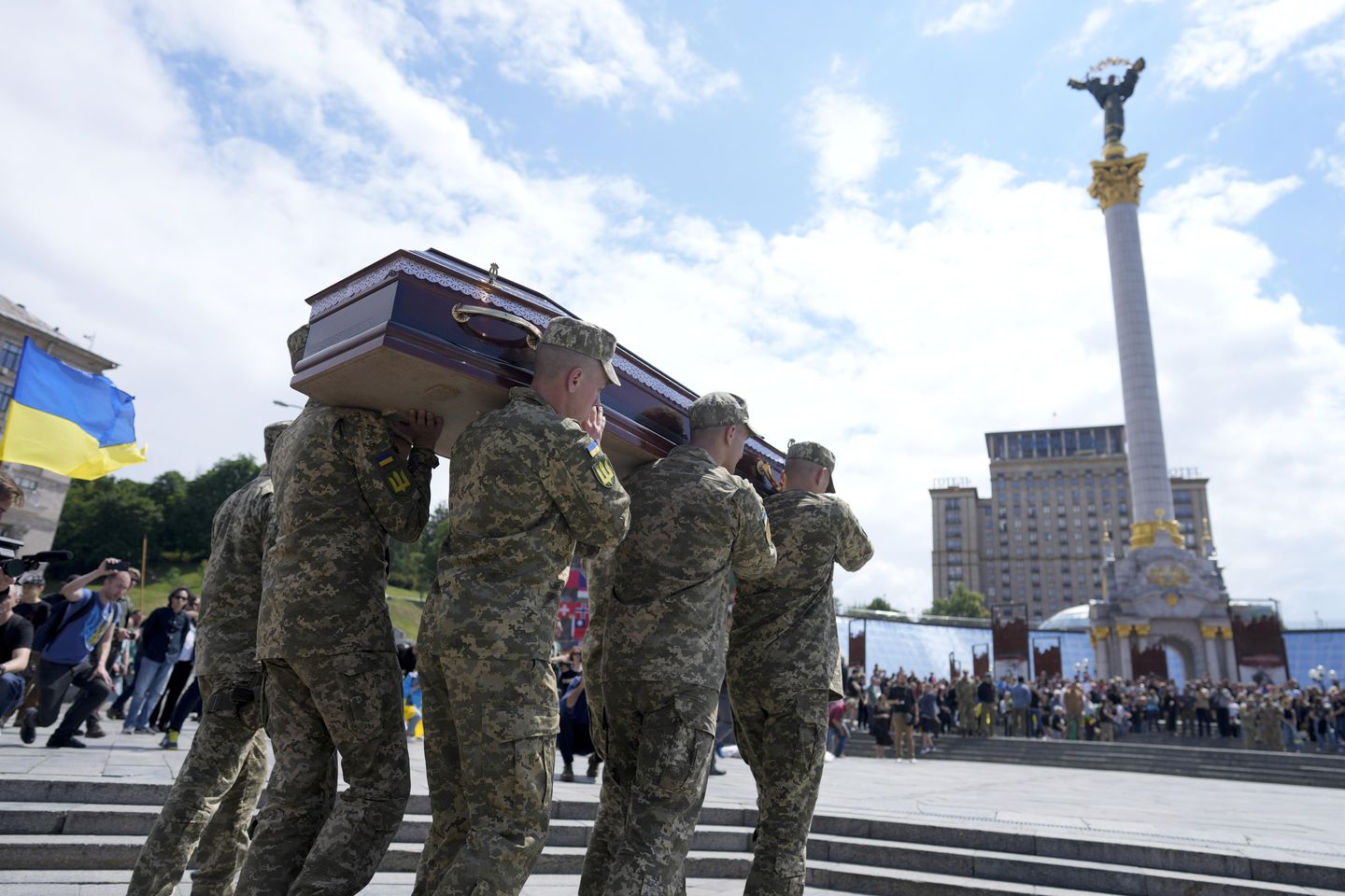In Ukraine, funeral for activist killed and mourned in war