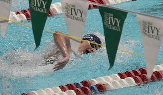 Pennsylvania transgender swimmer Lia Thomas swims in the first leg of the 800-yard freestyle relay at the Ivy League women&#39;s swimming and diving championships at Harvard, Wednesday, Feb. 16, 2022, in Cambridge, Mass. (AP Photo/Mary Schwalm, File)