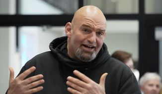 Pennsylvania Lt. Gov. John Fetterman visits with people attending a Democratic Party event for candidates to meet and collect signatures for ballot petitions for the upcoming Pennsylvania primary election, at the Steamfitters Technology Center in Harmony, Pa., March 4, 2022. The fate of the Democratic Party is intertwined in a pair of Pennsylvania elections that’ll be closely watched this year. Fetterman could help the party keep control of the Senate. (AP Photo/Keith Srakocic, File)