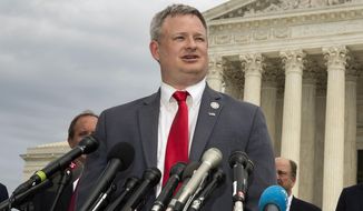 In this Sept. 9, 2019 file photo, South Dakota Attorney General Jason Ravnsborg, speaks to reporters in front of the U.S. Supreme Court in Washington. Ravnsborg faces the state&#39;s first impeachment trial next week for his conduct surrounding a 2020 car crash in which he struck and killed a pedestrian. (AP Photo/Manuel Balce Ceneta, File)