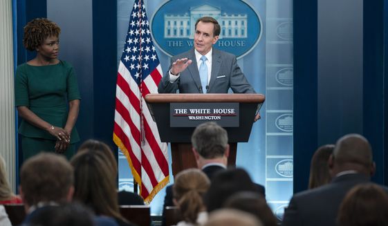 White House press secretary Karine Jean-Pierre listens as John Kirby, the National Security Council Coordinator for Strategic Communications, speaks during a press briefing at the White House, Tuesday, June 21, 2022, in Washington. (AP Photo/Evan Vucci)