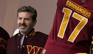 Dan Snyder, co-owner and co-CEO of the Washington Commanders, poses for photos during an event to unveil the NFL football team&#39;s new identity, Wednesday, Feb. 2, 2022, in Landover, Md. A woman accused Washington Commanders owner Dan Snyder of sexually harassing and assaulting her on a team plane in 2009, and the woman was later paid $1.6 million by the team to settle her claims, according to a document obtained by the Washington Post, Tuesday, June 21, 2022. (AP Photo/Patrick Semansky, File) **FILE**