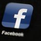 In this May 16, 2012, file photo, the Facebook logo is displayed on an iPad in Philadelphia. Facebook will change its algorithms to prevent discriminatory housing advertising and its parent company will subject itself to court oversight to settle a lawsuit brought by the U.S. Department of Justice on Tuesday, June 21, 2022. (AP Photo/Matt Rourke, File)