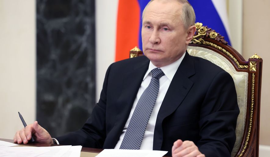 Russian President Vladimir Putin leads a State Consul meeting in Moscow, Russia, Tuesday, June 21, 2022. (Mikhail Metzel, Sputnik, Kremlin Pool Photo via AP)