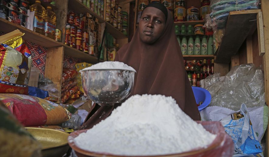 A shopkeeper sells wheat flour in the Hamar-Weyne market in the capital Mogadishu, Somalia on May 26, 2022. &amp;quot;Africa is actually taken hostage&amp;quot; in Russia&#39;s invasion of Ukraine amid catastrophically rising food prices, Ukrainian President Volodymyr Zelenskyy told the African Union during a closed-door address on Monday, June 20, 2022. (AP Photo/Farah Abdi Warsameh, File)