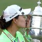Minjee Lee, of Australia, kisses the Harton S. Semple Trophy after Lee won the final round of the U.S. Women&#39;s Open golf tournament at the Pine Needles Lodge &amp;amp; Golf Club in Southern Pines, N.C., on Sunday, June 5, 2022. Minjee Lee, of Australia, won the match. (AP Photo/Steve Helber) **FILE**