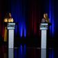 Former state Rep. Dee Dawkins-Haigler, left, and Georgia State Rep. Bee Nguyen, right, participate in Georgia&#x27;s secretary of state democratic primary election runoff debates on Monday, June 6, 2022, in Atlanta. (AP Photo/Brynn Anderson)