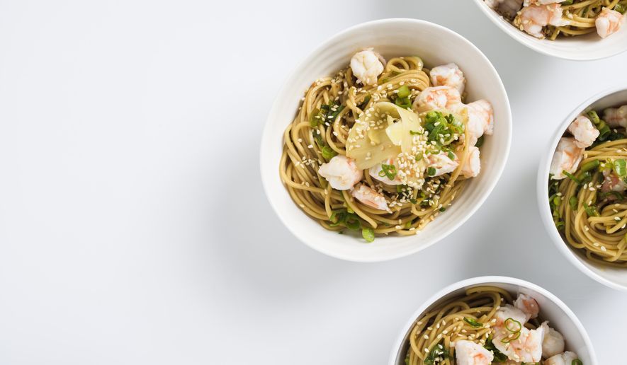 This image released by Milk Street shows a recipe for Ramen Salad with Shrimp and Scallions. (Milk Street via AP)