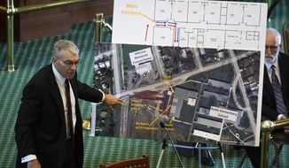 Texas Department of Public Safety Director Steve McCraw uses maps and graphics to present a timeline of the school shooting at Robb Elementary School in Uvalde, during a hearing, Tuesday, June 21, 2022, in Austin, Texas. Two teachers and 19 students were killed. (Sara Diggins/Austin American-Statesman via AP)