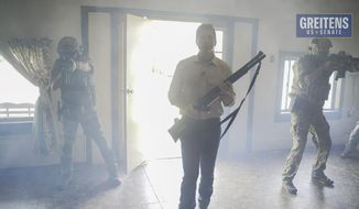 This image from video from a campaign ad by Eric Greitens for U.S. Senate, shows Greitens, a Republican candidate for U.S. Senate in Missouri, in a campaign video ad that shows him brandishing a long gun and declaring that he&#39;s hunting RINOs, or Republicans In Name Only. The video was scraped off Facebook within a few hours Monday, June 20, 2022. It remains live, however, on YouTube, where it&#39;s been watched thousands of times. You can also still see the video on Twitter, but you can&#39;t retweet it. (Courtesy of Eric Greitens for U.S. Senate via AP)
