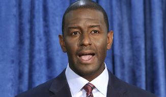 In this Nov. 10, 2018 file photo, Andrew Gillum, then-Democratic candidate for governor, speaks at a news conference in Tallahassee, Fla. Gillum, the 2018 Democratic nominee for Florida governor, is facing 21 federal charges related to a scheme to seek donations and funnel a portion of them back to him through third parties. The U.S. attorney&#39;s office announced the indictment Wednesday, June 22, 2022.  (AP Photo/Steve Cannon, File)