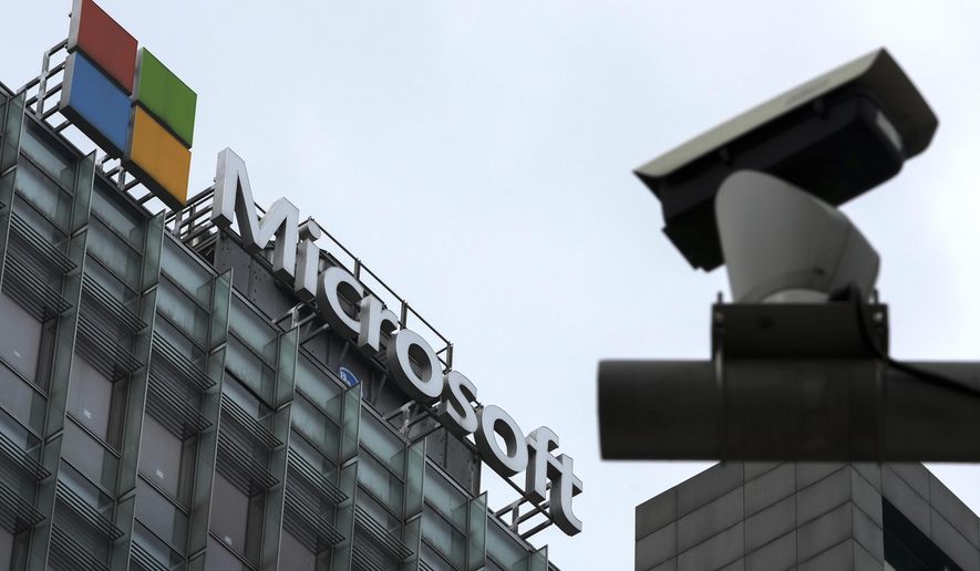 A security surveillance camera is seen near the Microsoft office building in Beijing, July 20, 2021. Coinciding with unrelenting cyberattacks against Ukraine, state-backed Russian hackers have engaged in “strategic espionage” against governments, think tanks, businesses and aid groups in 42 countries supporting Kyiv, Microsoft says in a new report. (AP Photo/Andy Wong, File)