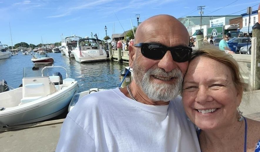 In this photo released by the U.S. Coast Guard, Yanni Nikopoulos, left, is pictured with Dale Jones. The U.S. Coast Guard is searching for the pair reported overdue after they failed to return when expected from a sailing trip to Portugal’s Azores. (Courtesy of the U.S. Coast Guard)