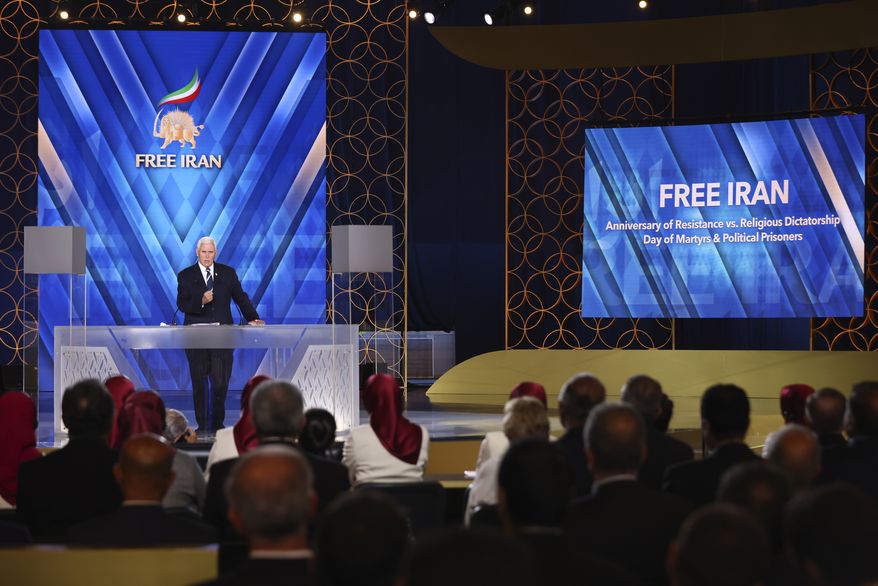 Former U.S. Vice President Mike Pence speaks at the Iranian opposition headquarters in Albania, where up to 3,000 MEK members reside at Ashraf-3 camp in Manza town, about 30 kilometers (16 miles) west of Tirana, Albania, Thursday, June 23, 2022. (AP Photo/Franc Zhurda)