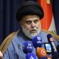 FILE - Populist Shiite cleric Muqtada al-Sadr, speaks during a mews conference in Najaf, Iraq,  Nov. 18, 2021. Iraq’s Parliament is set to hold a session Thursday, June 23, 2022, to vote in replacements for 73 lawmakers who resigned earlier this month. The collective walkout by followers of al-Sadr, Iraq’s most influential Shiite politician, threw Iraq into further uncertainty, deepening a months-long political crisis over government formation. (AP Photo/Anmar Khalil, File)